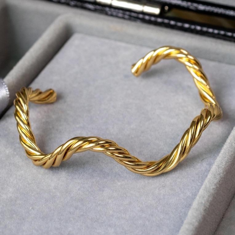 Bracelete Ondulado Torcido Ouro New